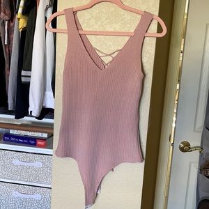 Light pink body suit